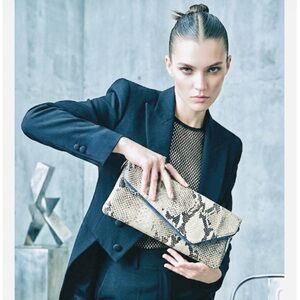 Henri Bendel Black and Gray Snakeskin Clutch w green inner lining 11” x 5”